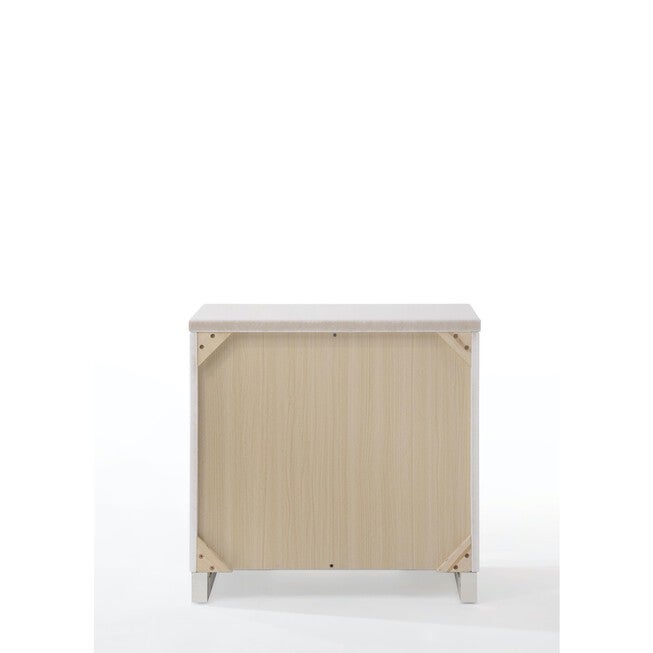 Unfinished interior back of a white nightstand with open back panel
