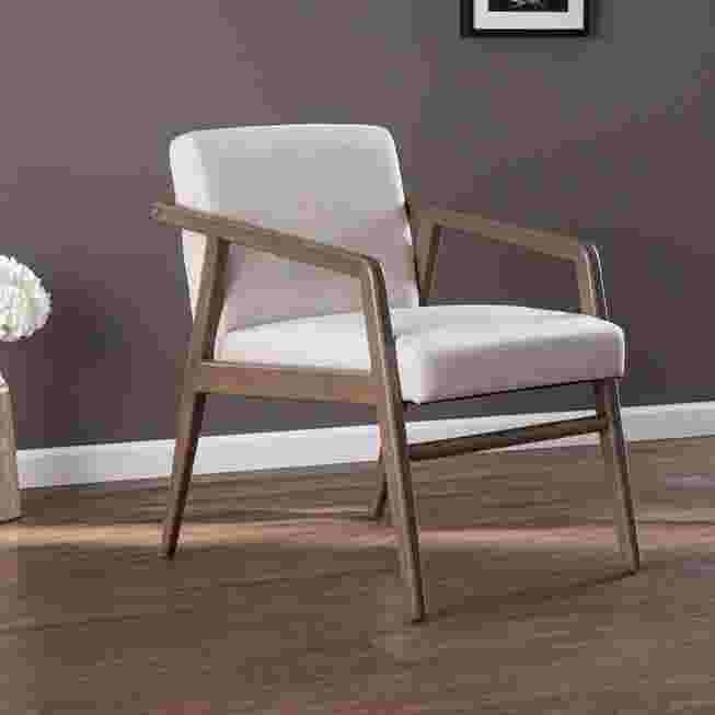 White upholstered accent chair in a room