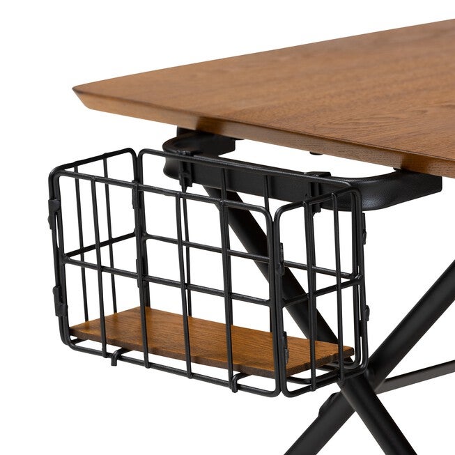 Close-up of black wire basket under natural brown coffee table top