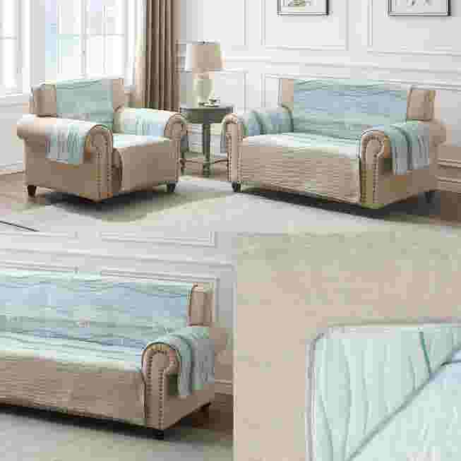 Set of matching aqua furniture protectors on couches in living room
