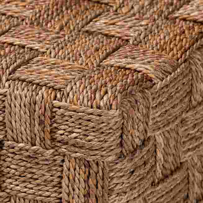 Close-up of woven rope-like strands in seagrass weave