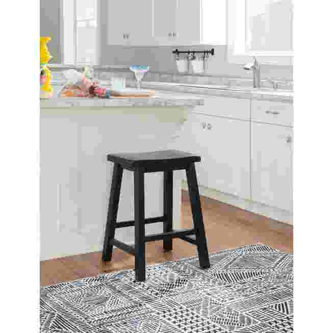 Black stool in kitchen setting