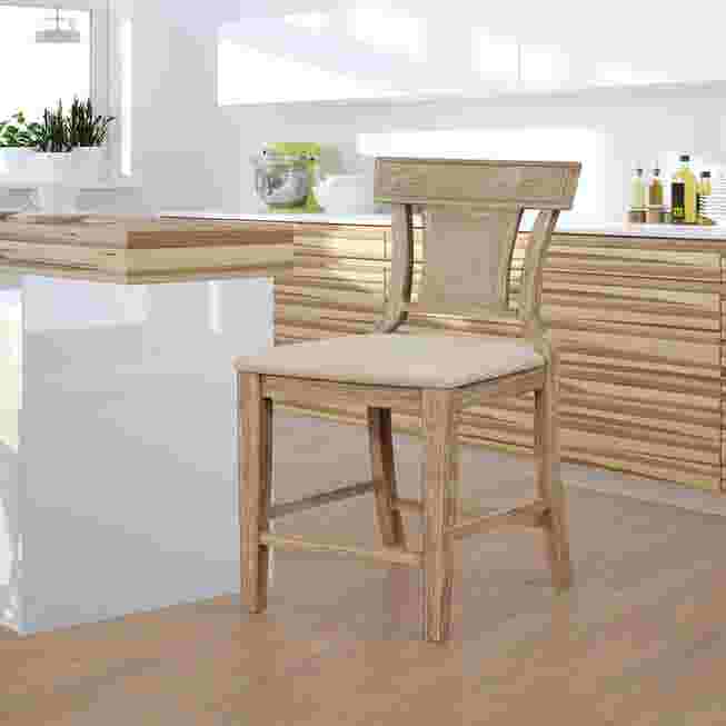 Duncan counter stool in a kitchen with other furniture