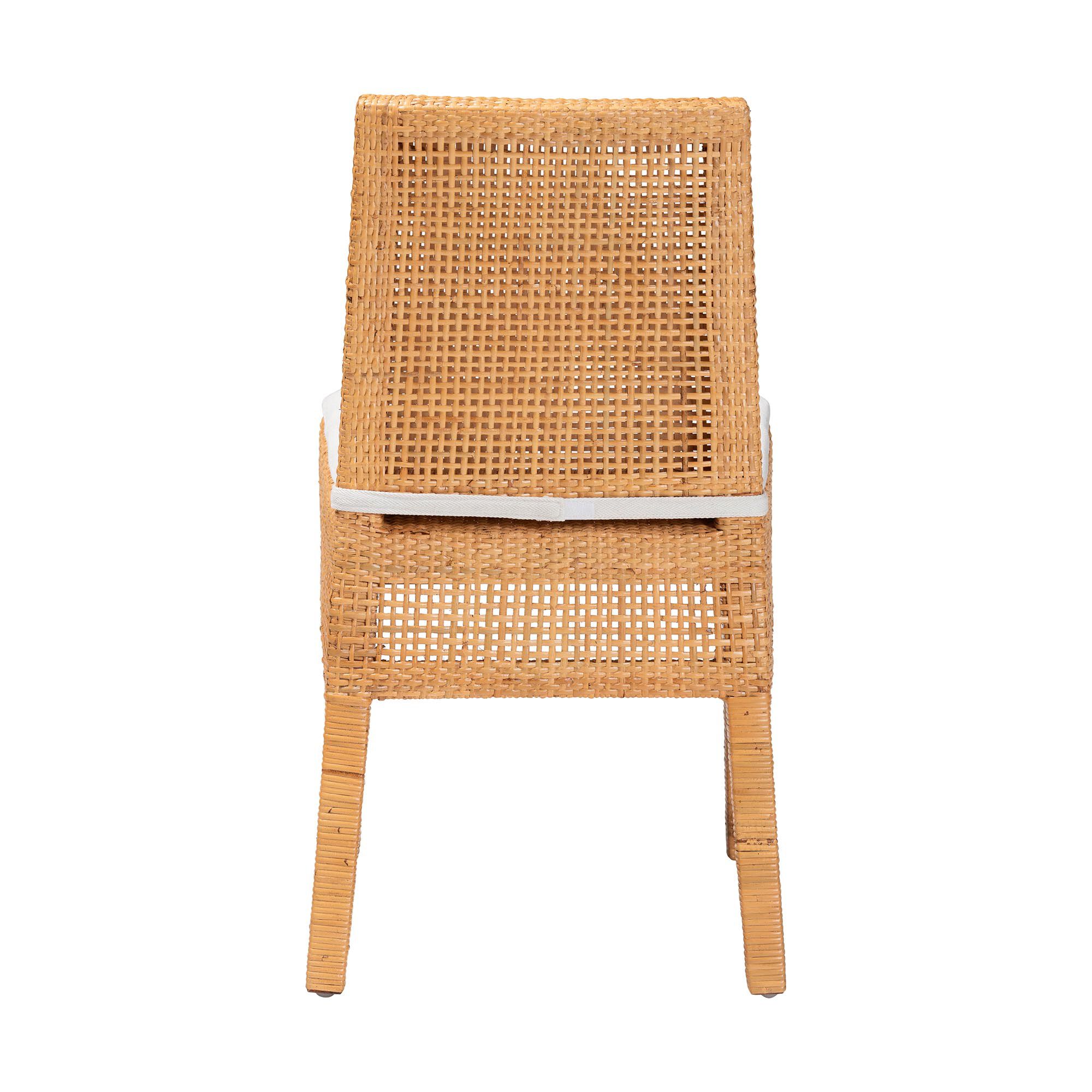 Light honey rattan dining chair with white seat cushion, back view