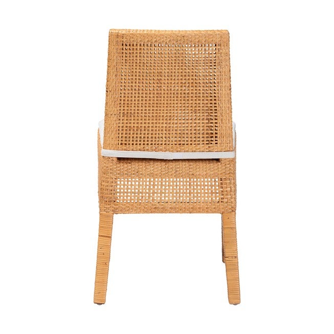 Light honey rattan dining chair with white seat cushion, back view