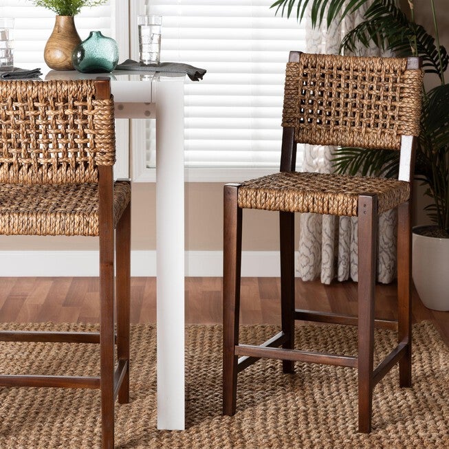 Handwoven seagrass bar stool with dark wooden legs and back
