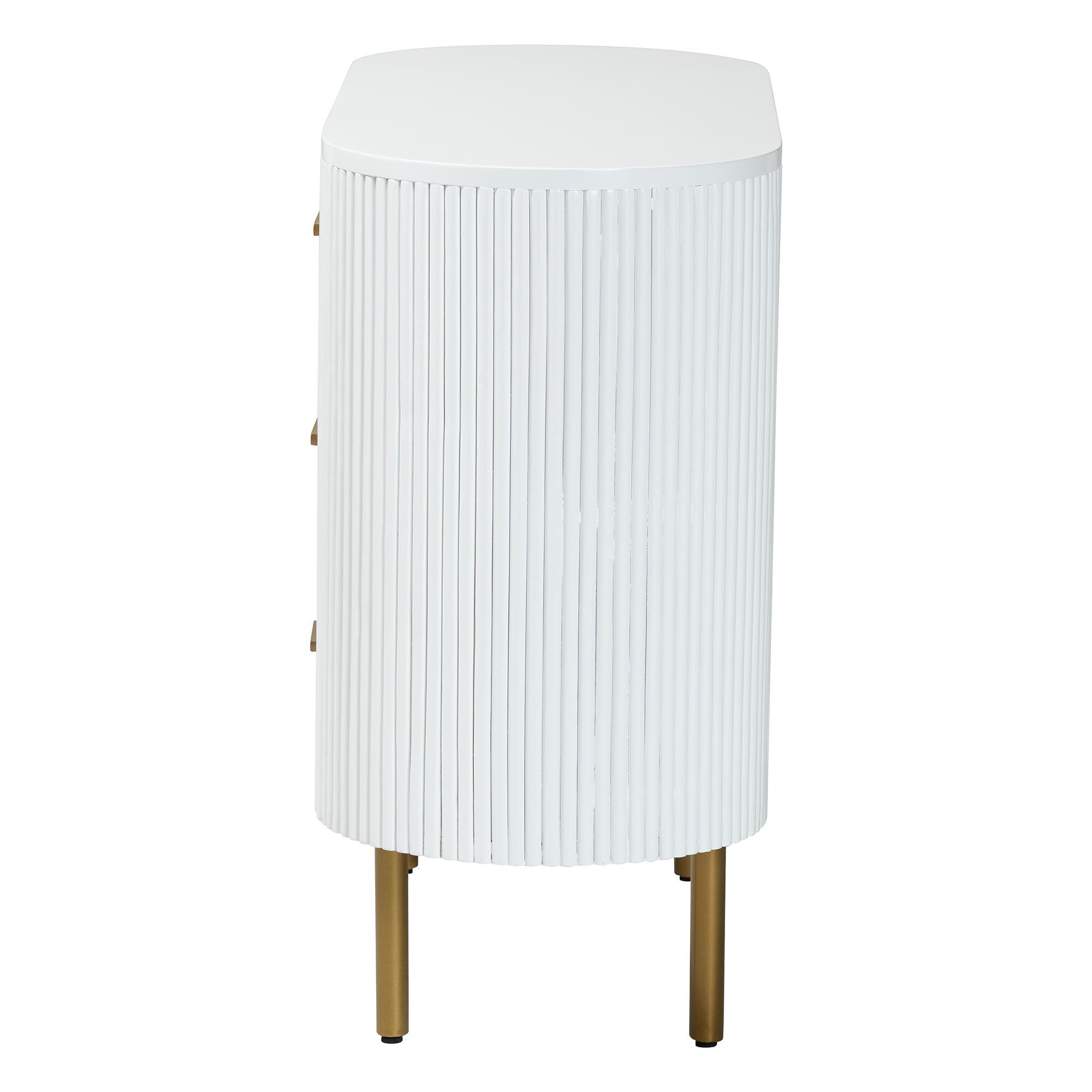 Side view of white fluted 3-drawer dresser with gold tapered legs