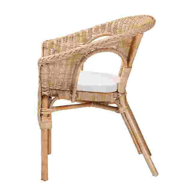 Side view natural rattan dining chair with white cushion