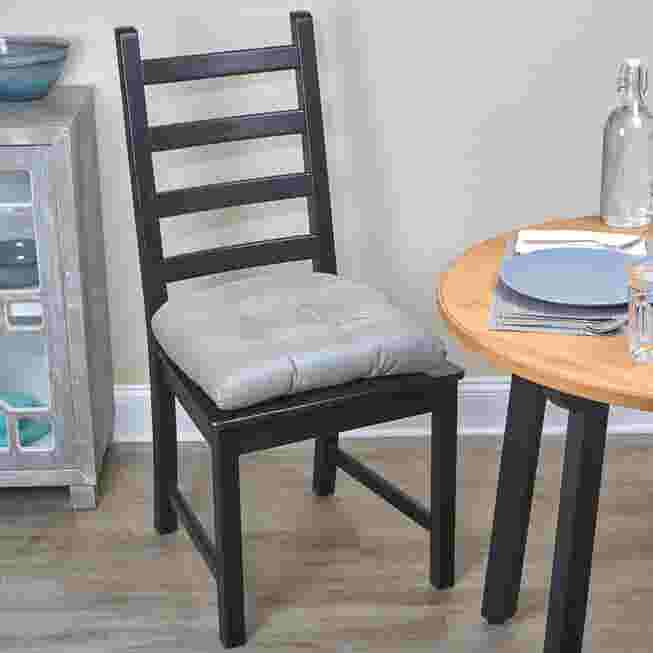 Gray Omega Gripper universal chair pad on chair seat.