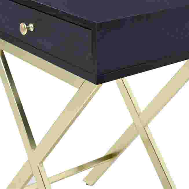 Drawer front and knob close-up on navy table