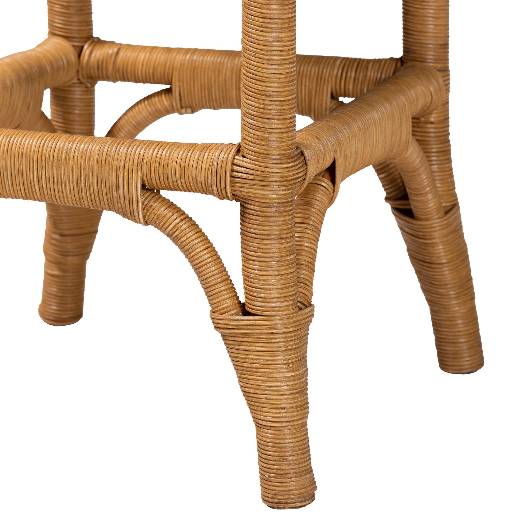 Close-up of honey rattan leg joints and woven lower support