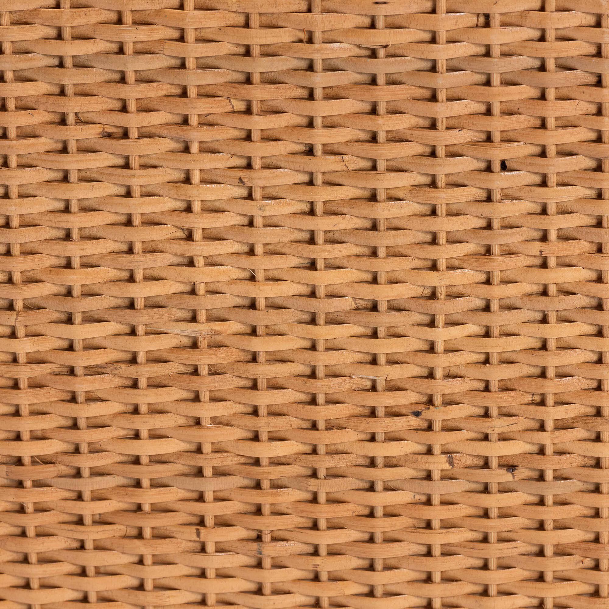 Close-up of tight woven rattan texture on natural end table