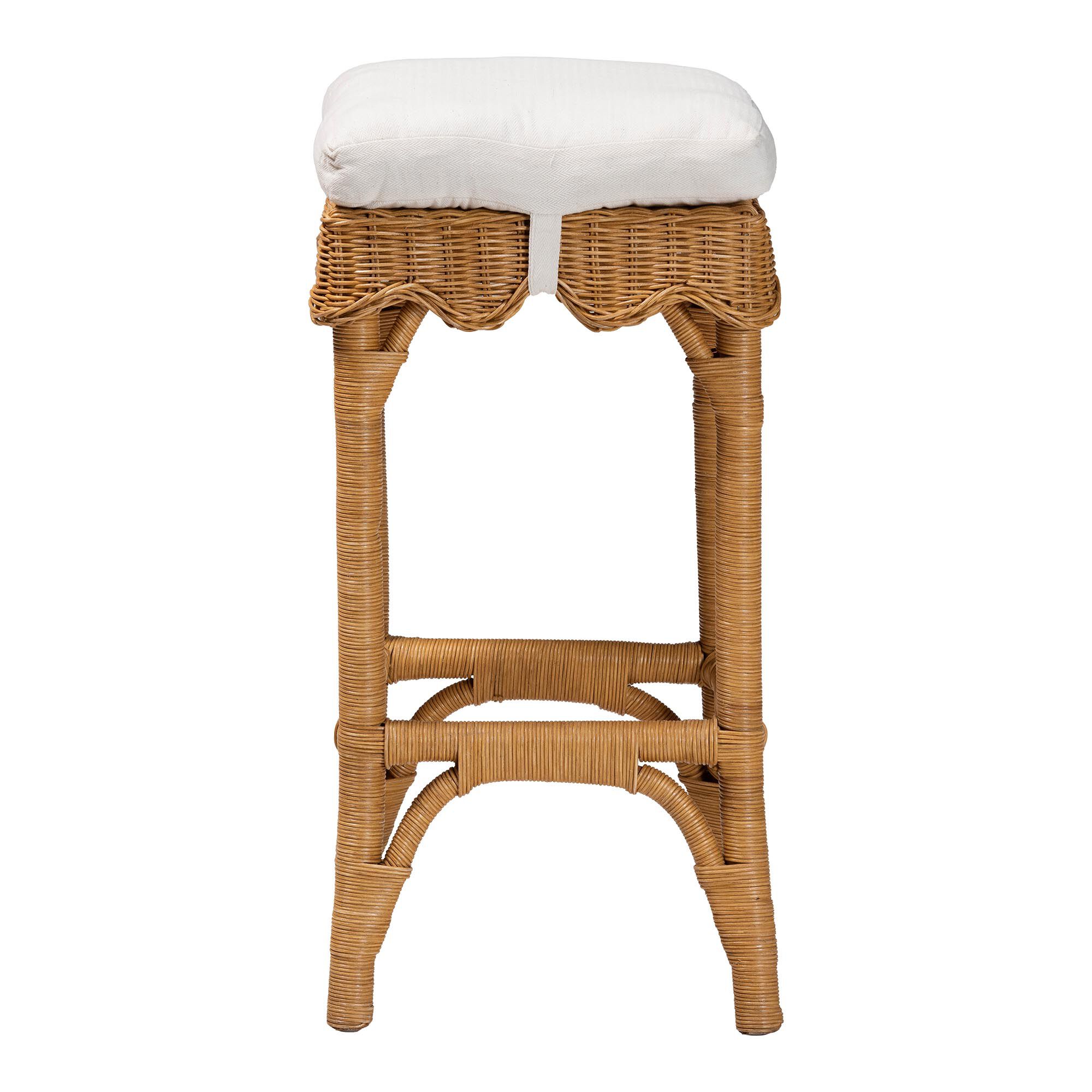 Honey rattan bar stool front view with white upholstered cushion