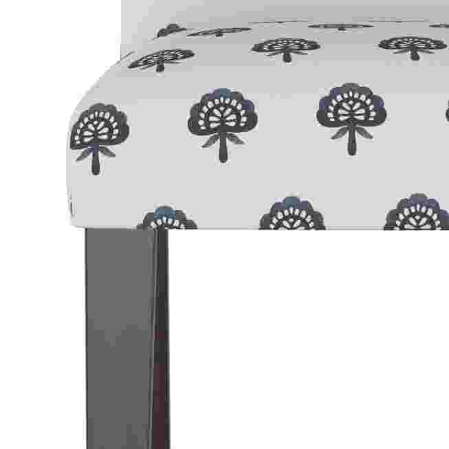 Close-up of chair seat edge with pattern
