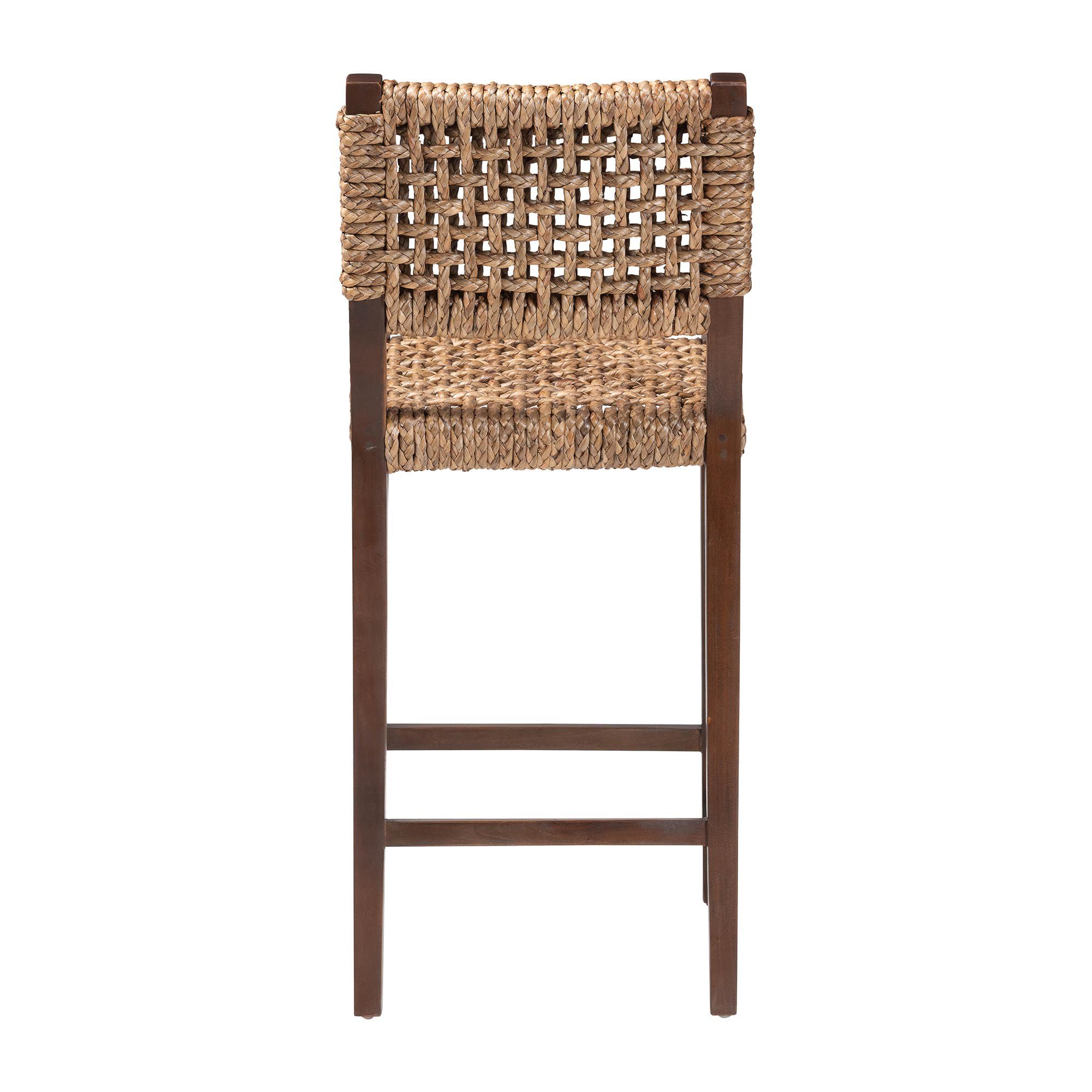 Handwoven seagrass bar stool back/side view with dark wood legs