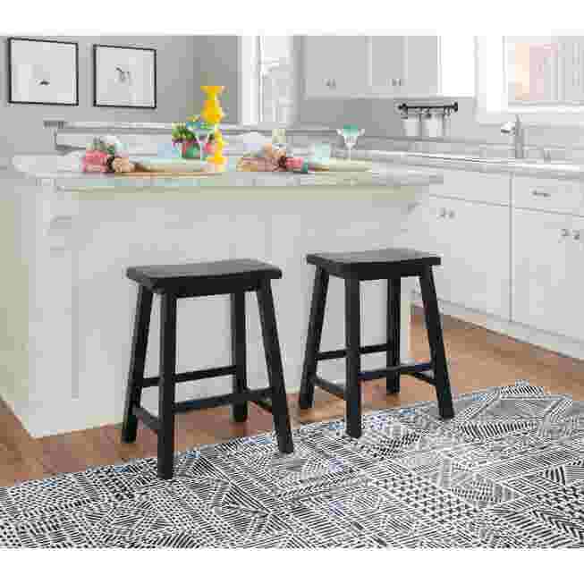 Two black stools in kitchen scene