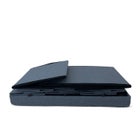 Gray storage ottoman with six drawers and cushioned top from an angle