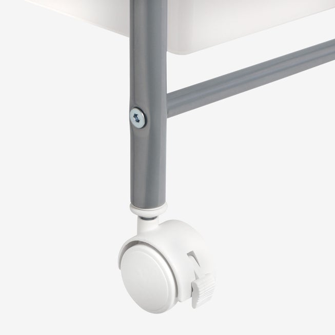 Close-up of cart caster wheel attached to the metal frame